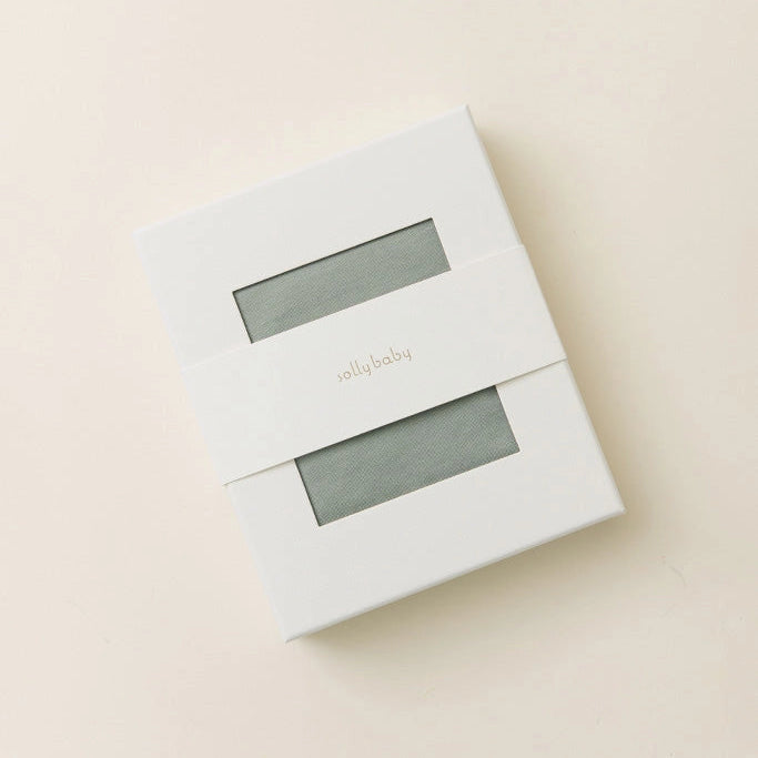 White box with a clear window on a beige background