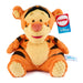 Plush toy tigger with GUND and Disney tags on a white background