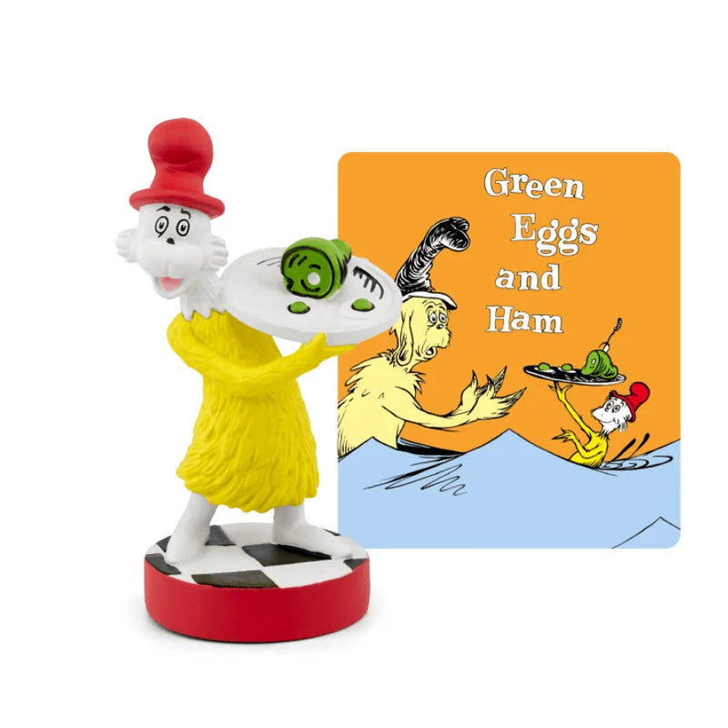 Sam-I-Am Tonie figurine standing next to the Green Eggs and Ham book by Dr. Seuss