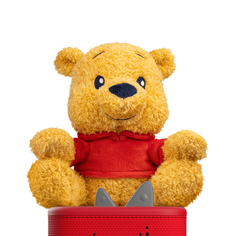 Plush bear toy with a red shirt on a white background