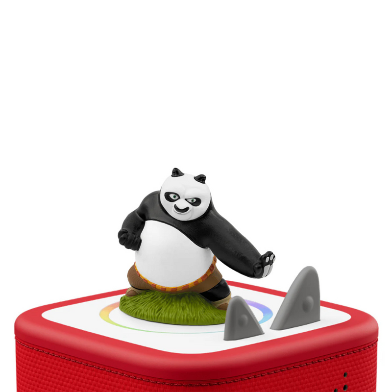 Panda figurine on a red base with a white background