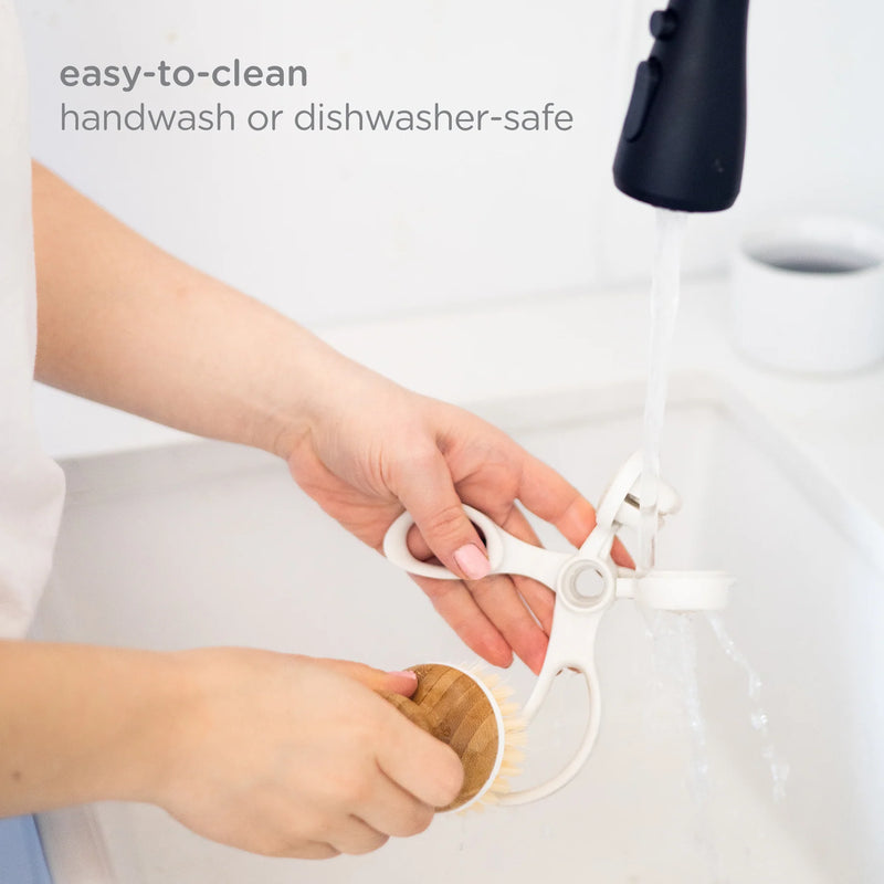 Cutter being washed under running water (dishwasher/handwash friendly).