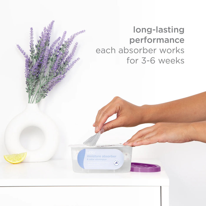 Person taking a moisture absorber from a container with lavender and lemon on a white background