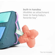 Back view of the Ubbi baby activity toy highlighting built-in fabric handles and soft construction