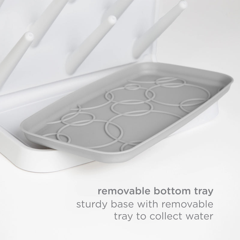 Removable bottom drip tray on the Ubbi Vertical Bottle Drying Rack