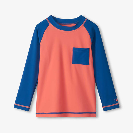 Long-sleeve shirt with blue sleeves and coral body on a white background