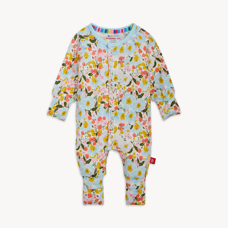 Floral-patterned baby onesie on a white background