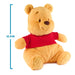 Winnie the Pooh plush with height marker showing 12.5 inches