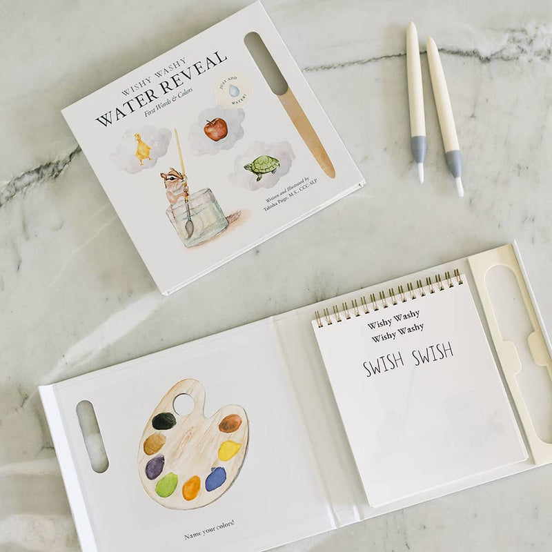 Children's book with watercolor illustrations on a marble surface