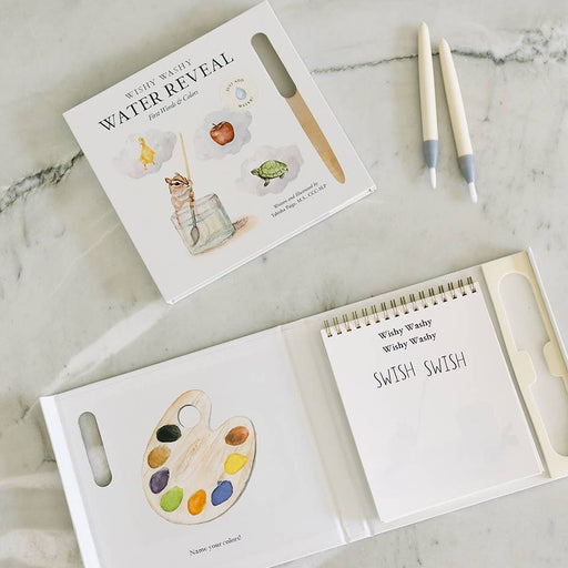 Children's book with watercolor illustrations on a marble surface