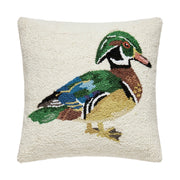 Decorative pillow with a colorful duck design on a white background