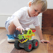 Toddler pushing WOW Toys Mack Monster Truck