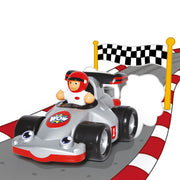 WOW Toys Richie Race Car with driver on a race track at the finish line