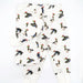 Flatlay of Saltwater Swaddles Duck the Halls kids pajamas with watercolor ducks wearing Santa hats on white background