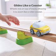 Toy taxi car on a track with text describing its features