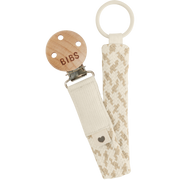BIBS braided pacifier clip with organic cotton strap, wooden detail, and metal clasp on a white background