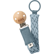 BIBS braided pacifier clip with organic cotton strap, wooden detail, and metal clasp on a white background