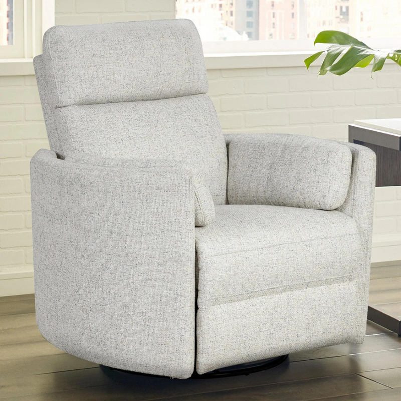Brixy Radius PLUS power swivel glider recliner in a light textured fabric by a sunny window