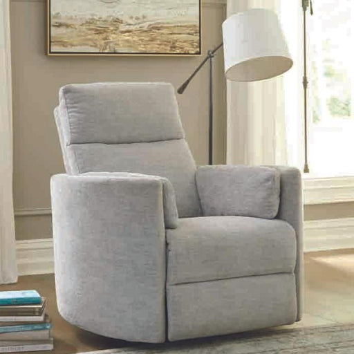 Brixy Radius PLUS power swivel glider recliner in Mineral Grey beside a floor lamp